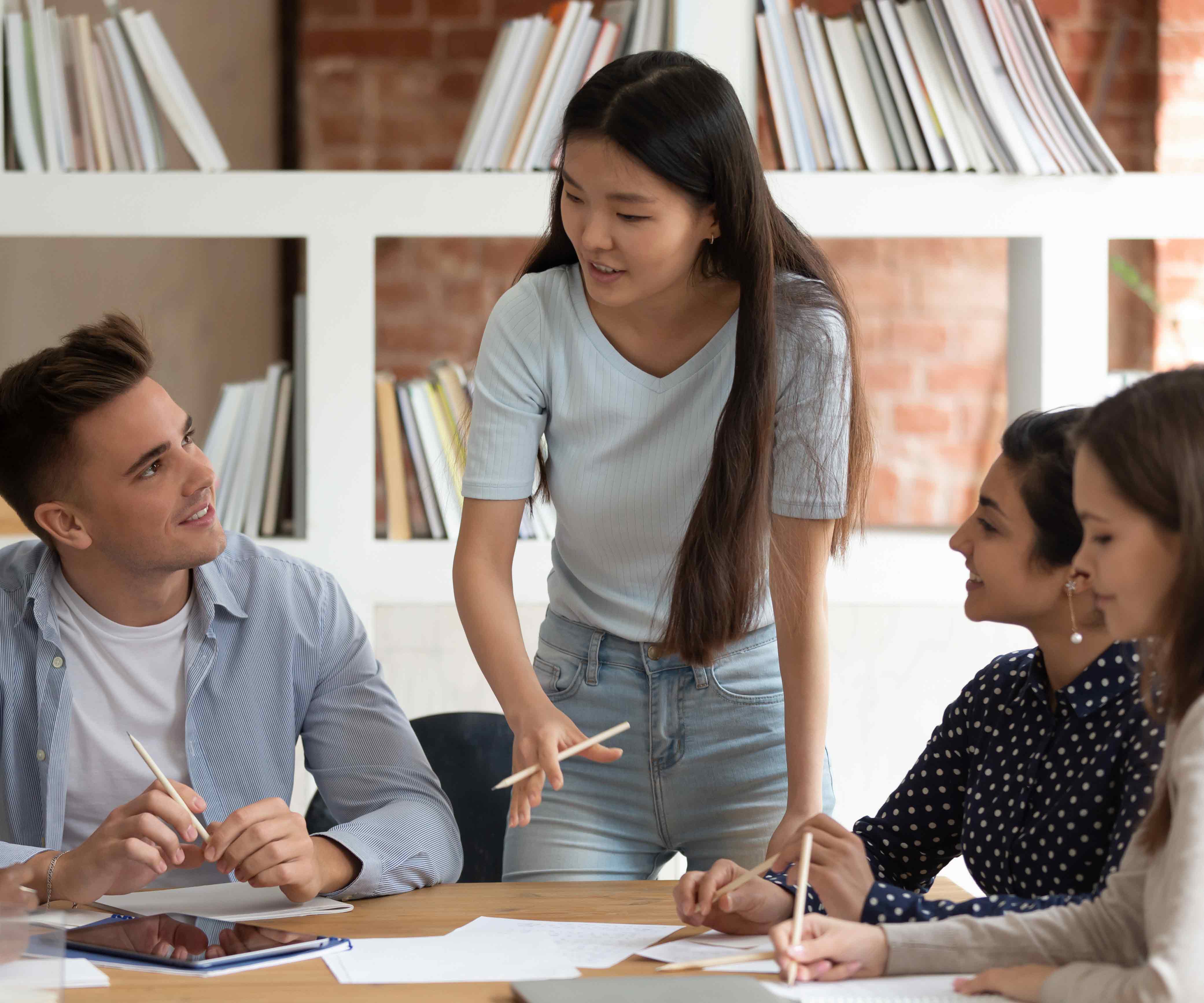 person presenting to colleagues
